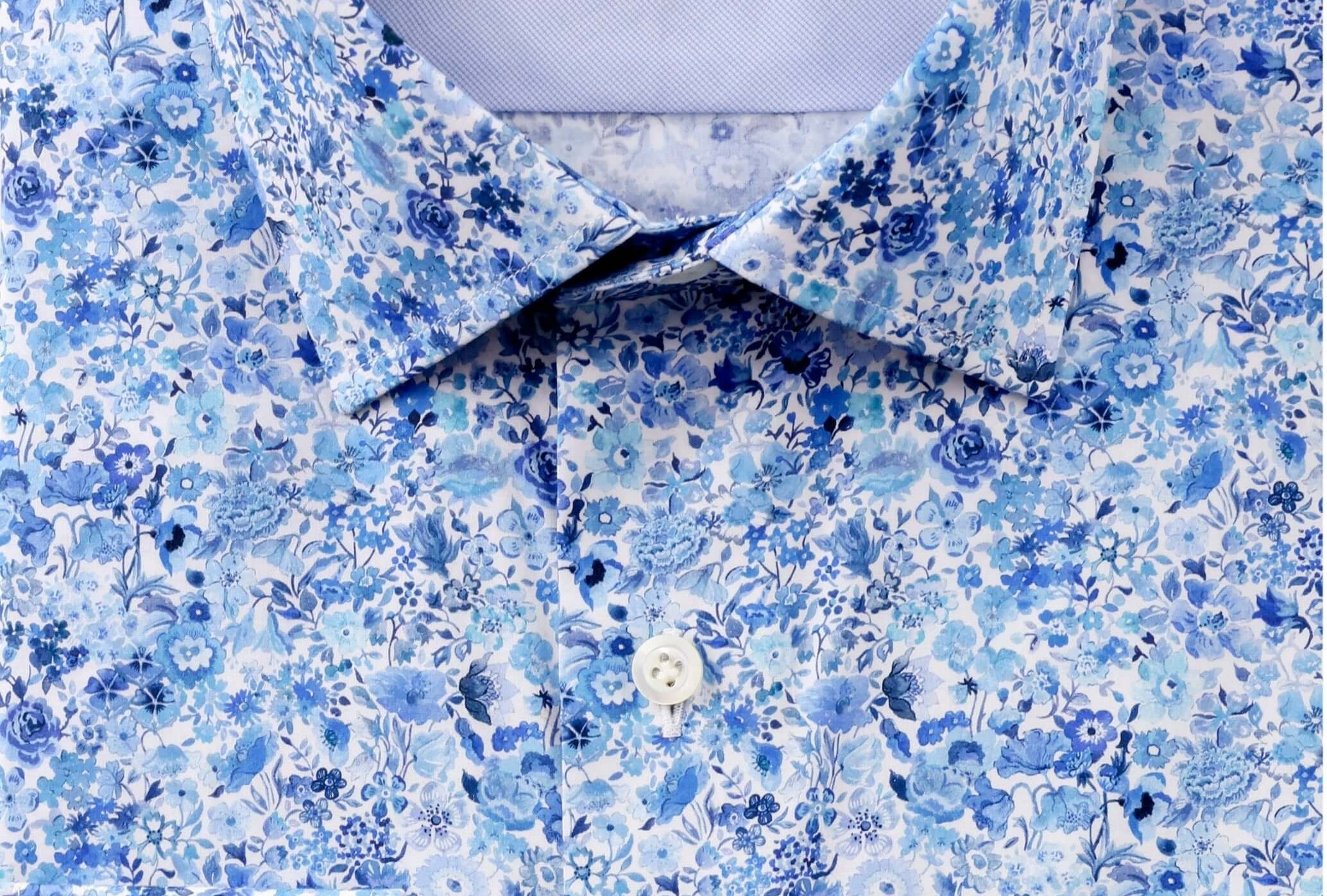 Close-up of Charles Luxury Men's Floral Dress Shirt – White/Blue | Treffort, featuring premium cotton with white and blue floral print.