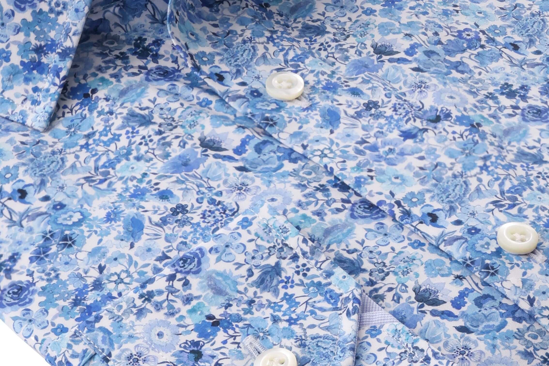 Charles Luxury Men's Floral Dress Shirt – White/Blue | Treffort, folded with white and blue floral print on premium cotton