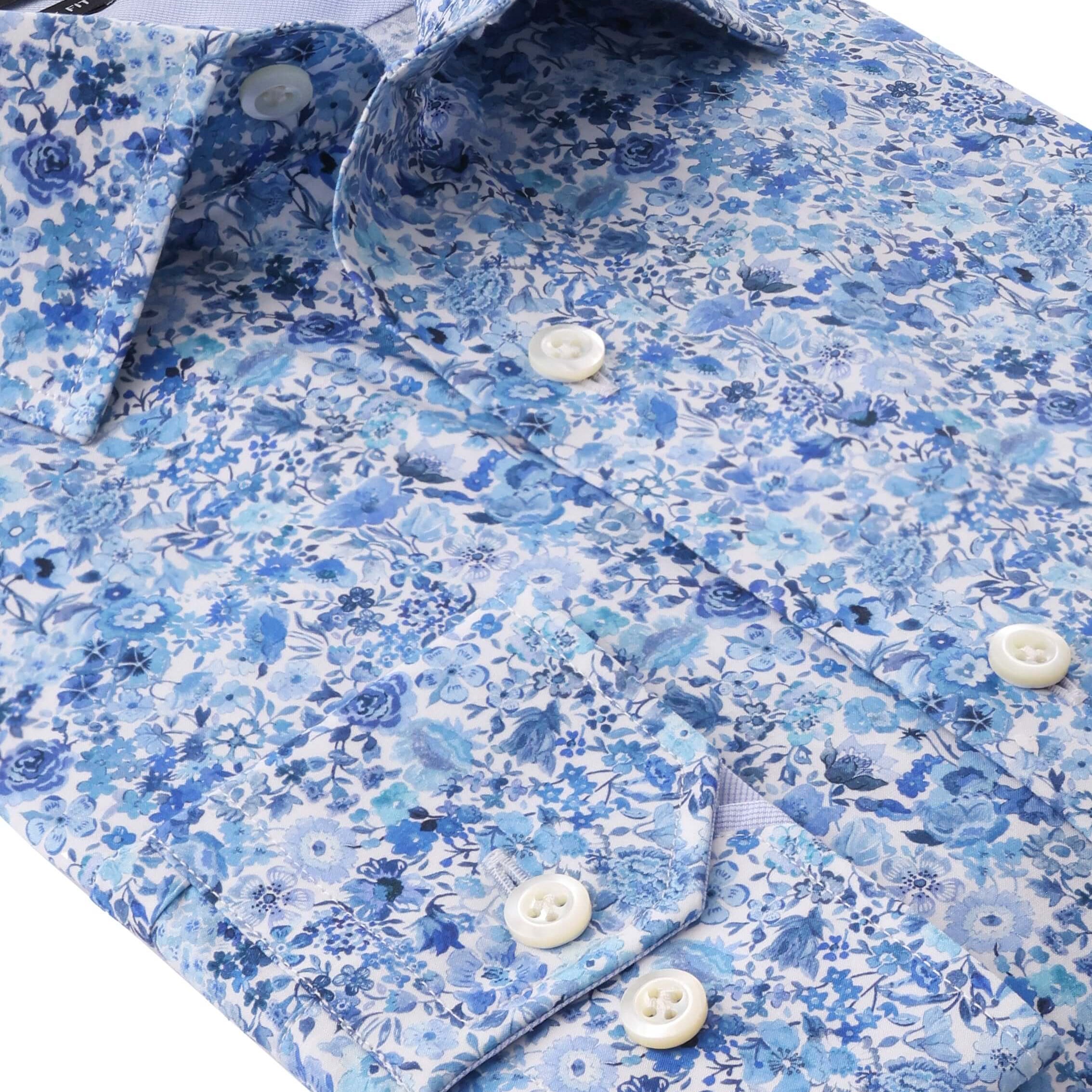 Charles Luxury Men's Floral Dress Shirt – White/Blue | Treffort, folded with white and blue floral print on premium cotton