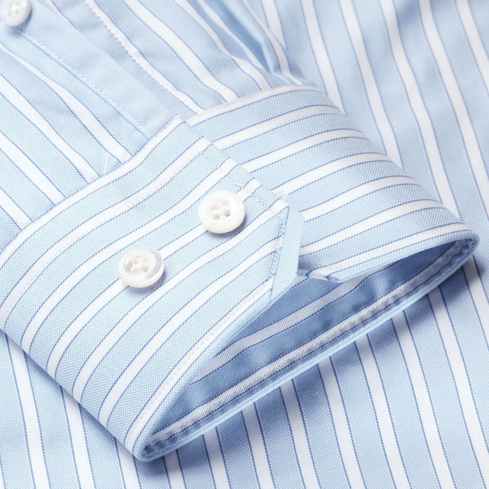 Hester Luxury Men's Striped Dress Shirt – Blue | Treffort with elegant white stripes on premium cotton fabric for timeless style.