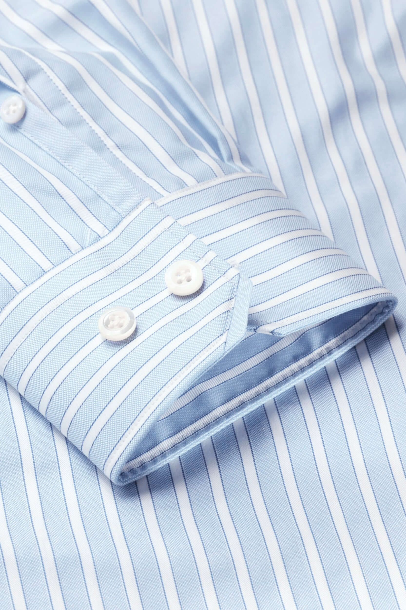 Hester Luxury Men's Striped Dress Shirt – Blue | Treffort with elegant white stripes on premium cotton fabric for timeless style.
