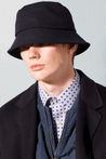 MODEL WEARING HIGH END LUXURY BLUE EMPIRE TILE PRINT CONTEMPORARY REGULAR FIT DRESS SHIRT WITH ART DECO PRINT